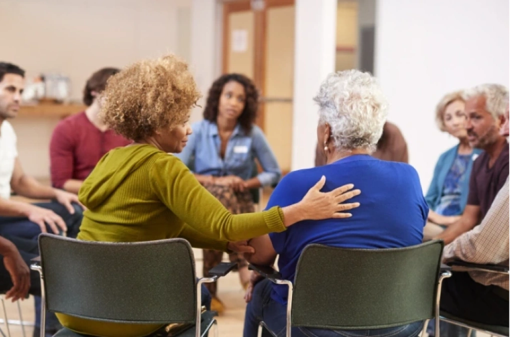 Support group sitting in a circle